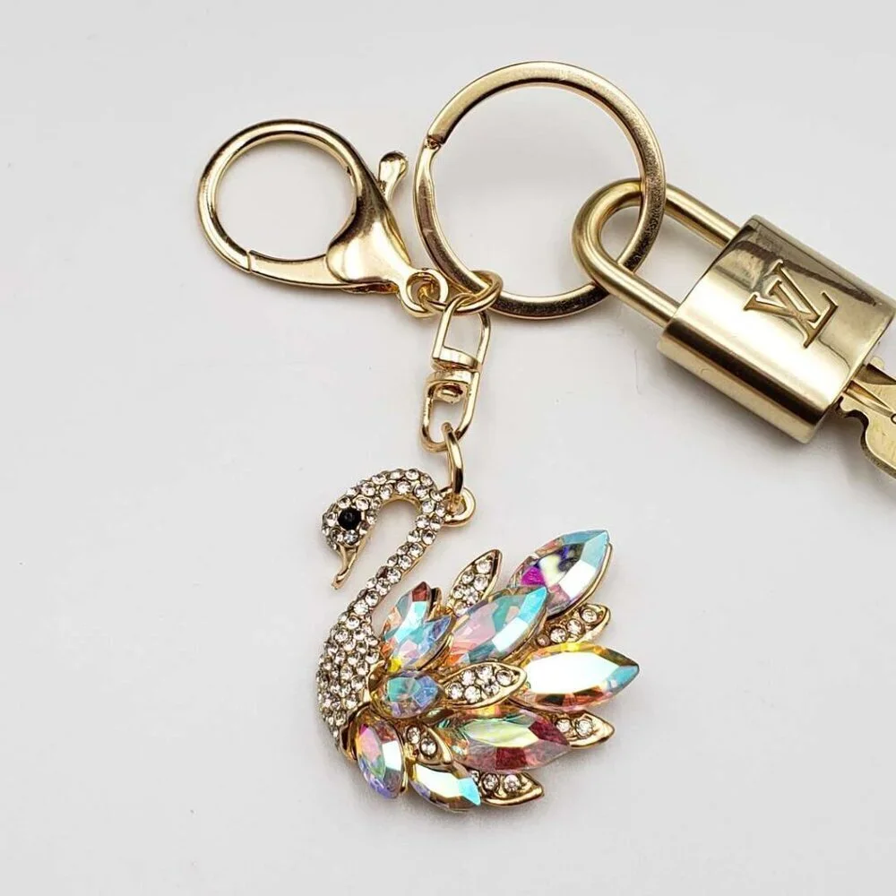 Authentic Louis Vuitton Gold Padlock & Key with Unbranded Swan Keychain - Picture 7 of 8